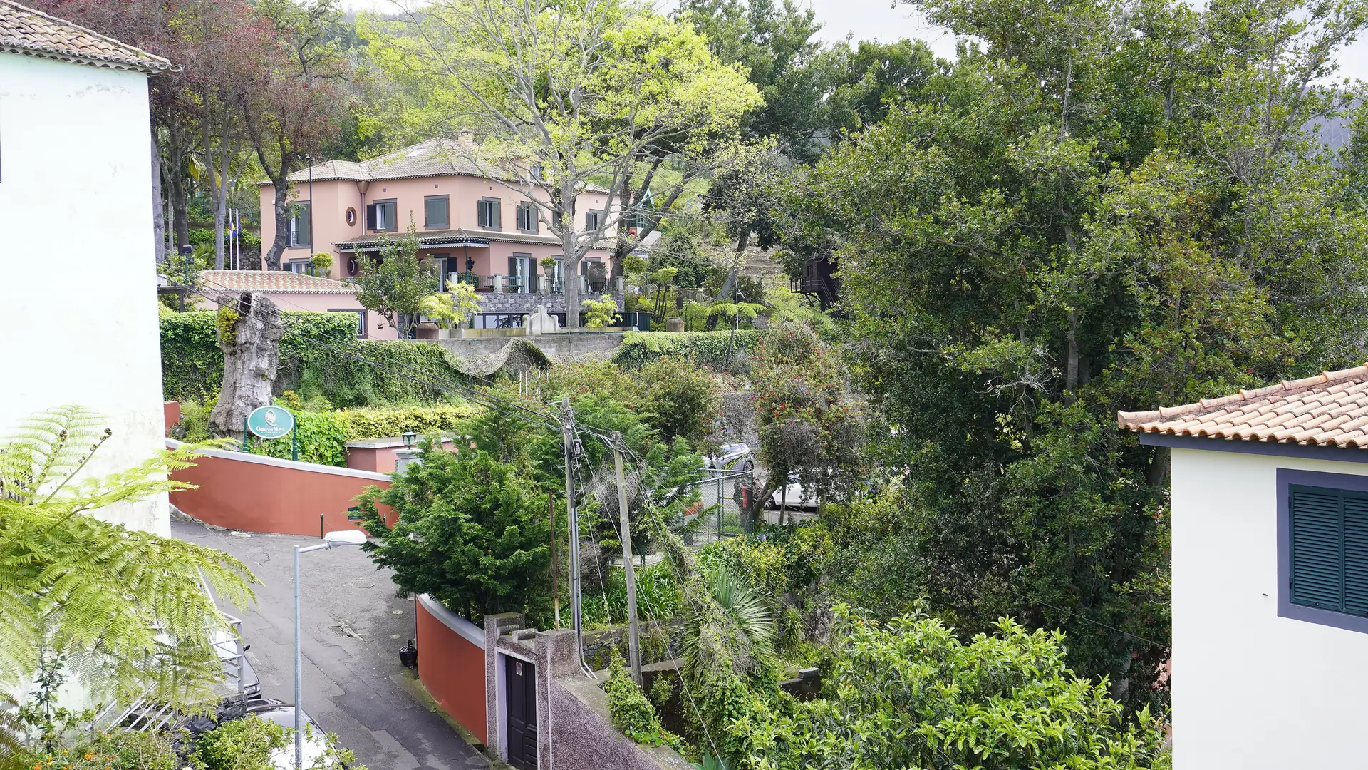 A pink quinta manor house among subtropical gardens above Funchal, Madeira