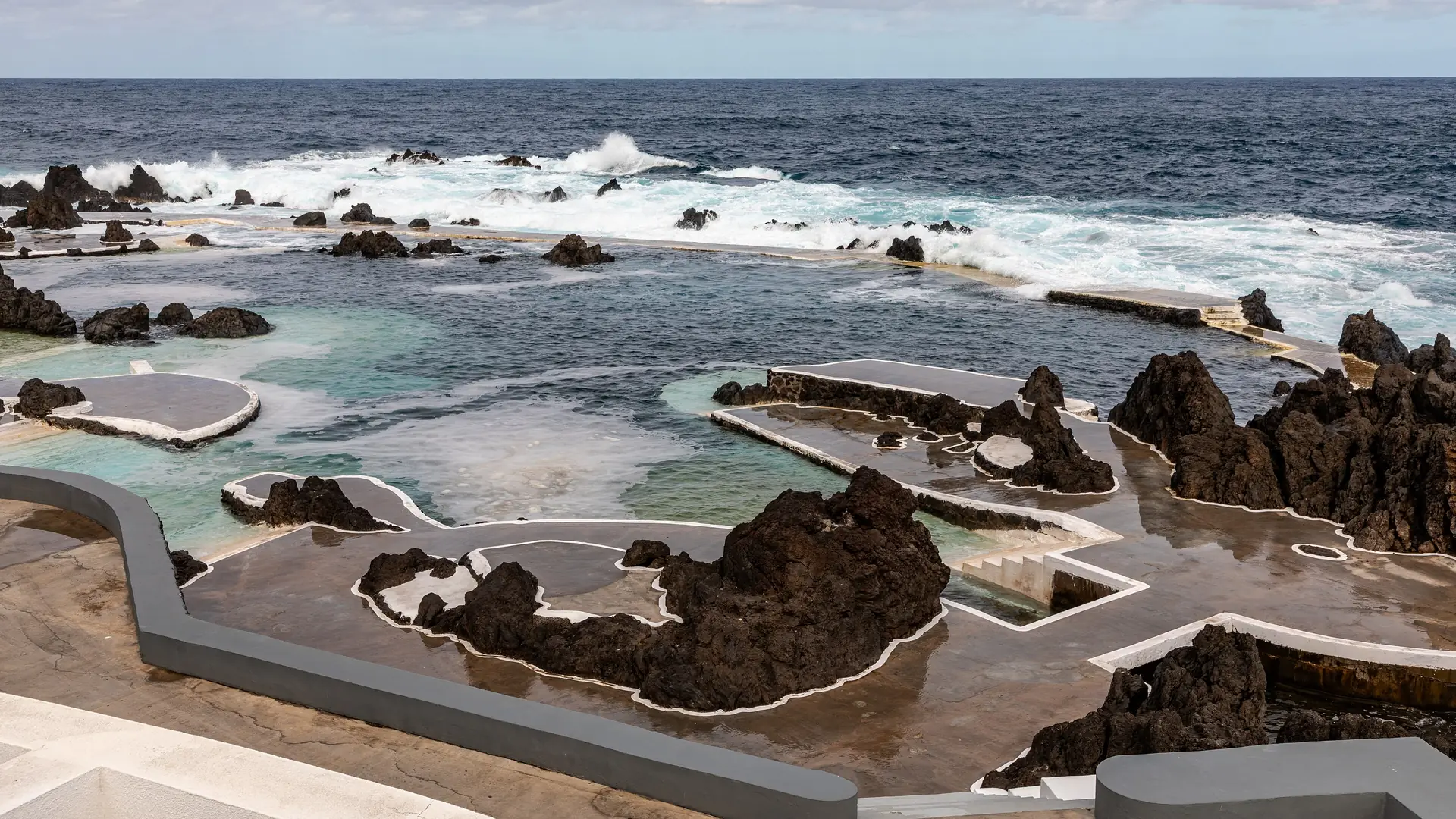 The natural volcanic swimming pools at Porto Moniz on Madeira's northwest coast